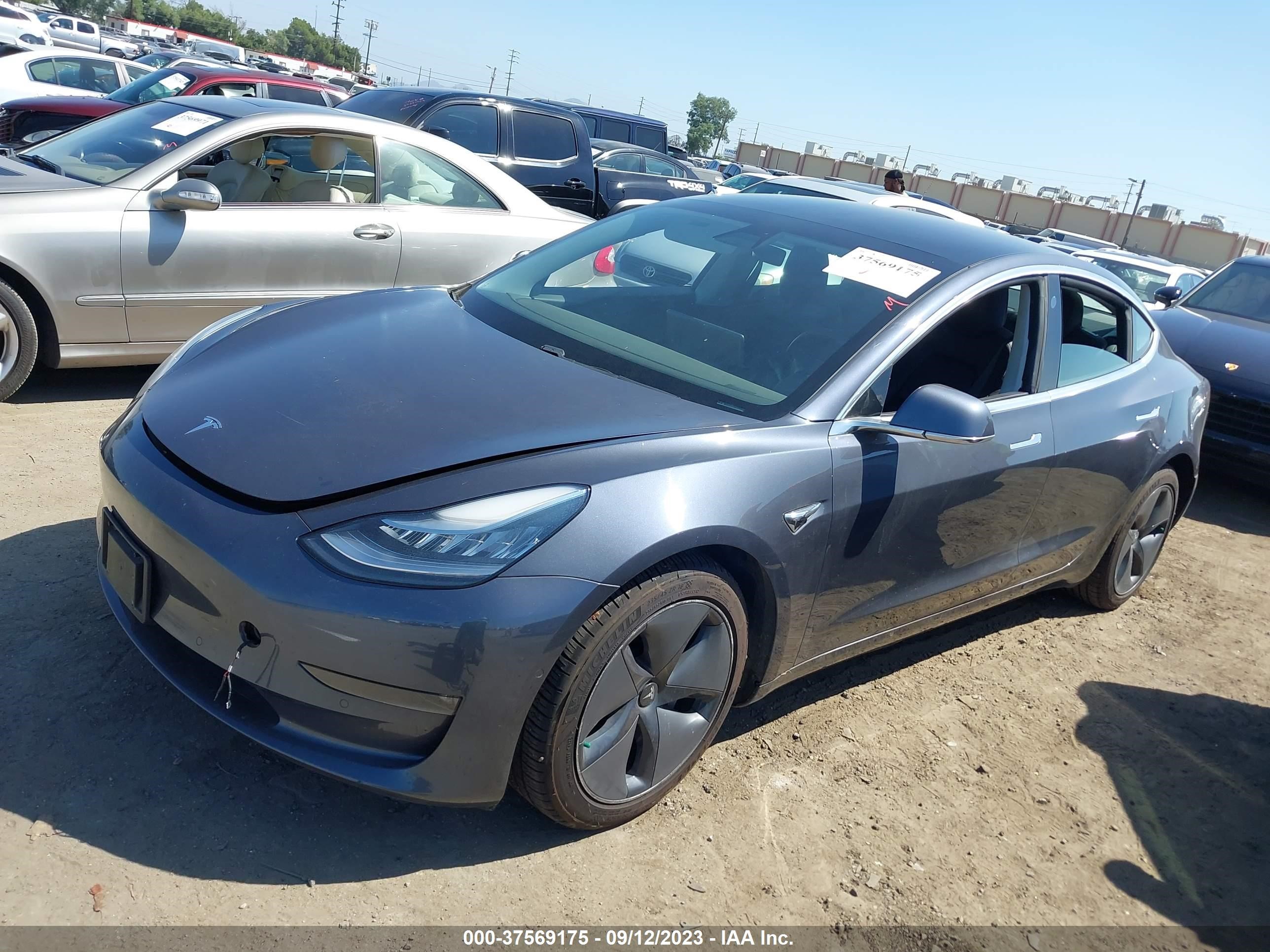 5YJ3E1EB9LF664043  tesla model 3 2020 IMG 1