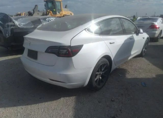 5YJ3E1EA7MF051220  tesla model 3 2021 IMG 3