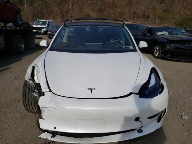 5YJ3E1EBXNF106799  tesla model 3 2022 IMG 4