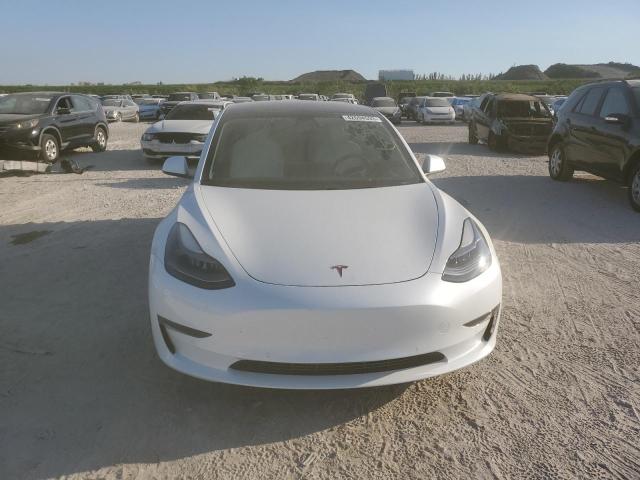 5YJ3E1EC5MF027676  tesla model 3 2021 IMG 4