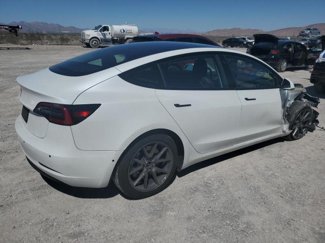 5YJ3E1EA3NF322033  tesla model 3 2022 IMG 2