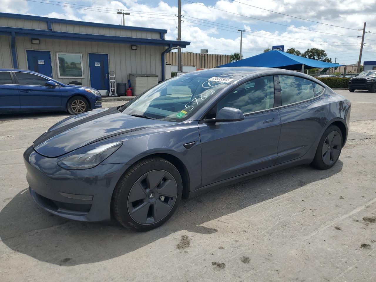 5YJ3E1EA4PF385760  tesla model 3 2023 IMG 0