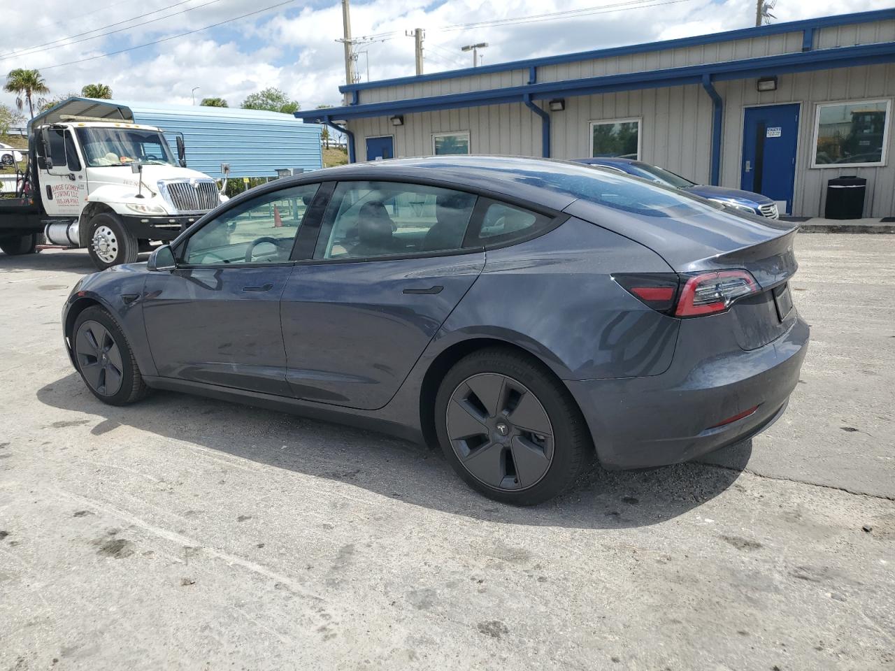 5YJ3E1EA4PF385760  tesla model 3 2023 IMG 1