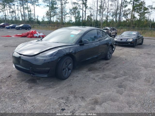 5YJ3E1EA6NF330899  tesla model 3 2022 IMG 1