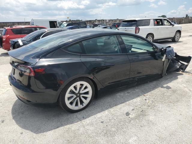 5YJ3E1EA6PF434702  tesla model 3 2023 IMG 2