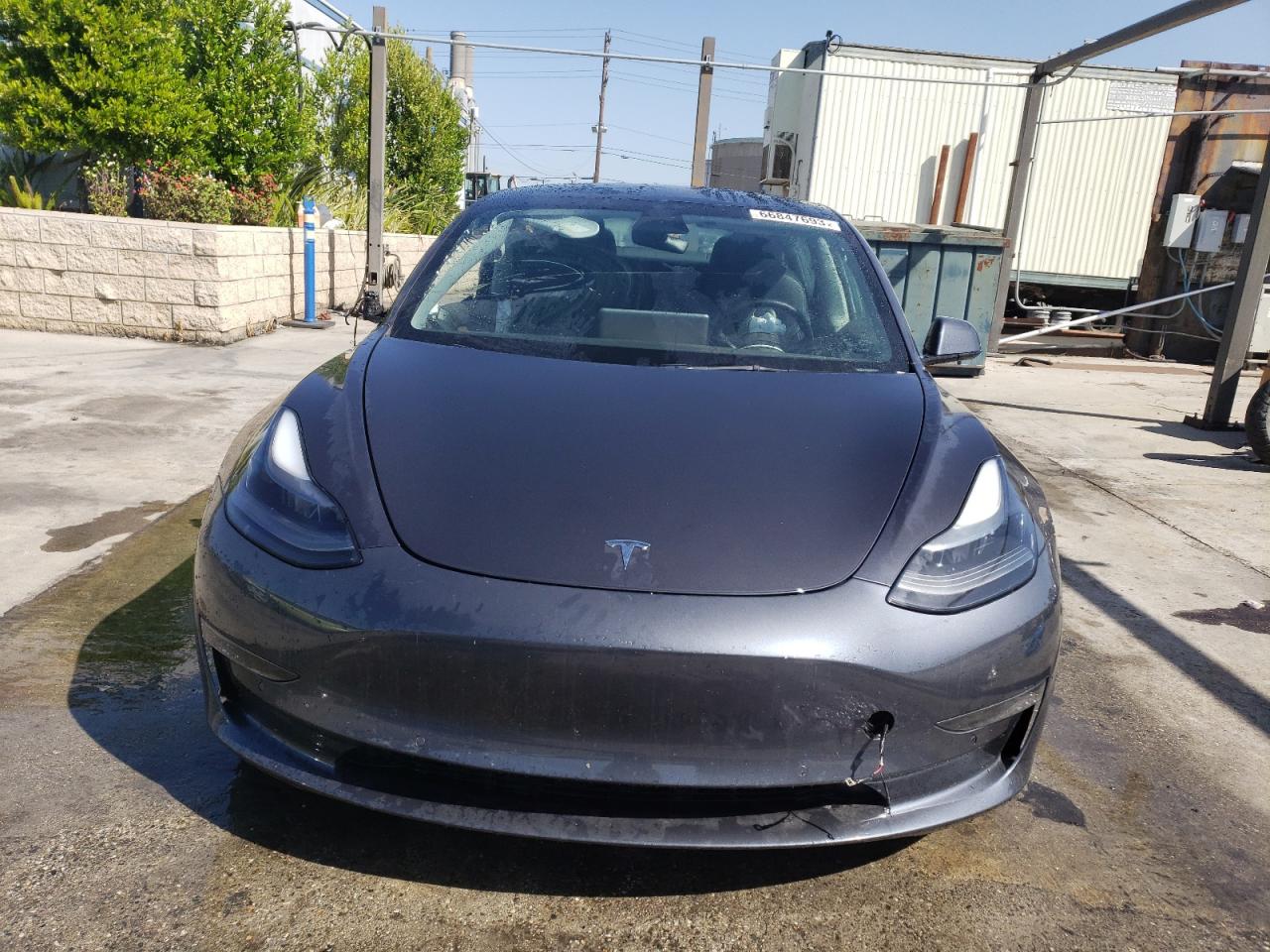 5YJ3E1EB0NF144185  tesla model 3 2022 IMG 4