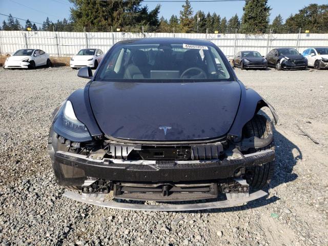 5YJ3E1EB0NF334438  tesla model 3 2022 IMG 4