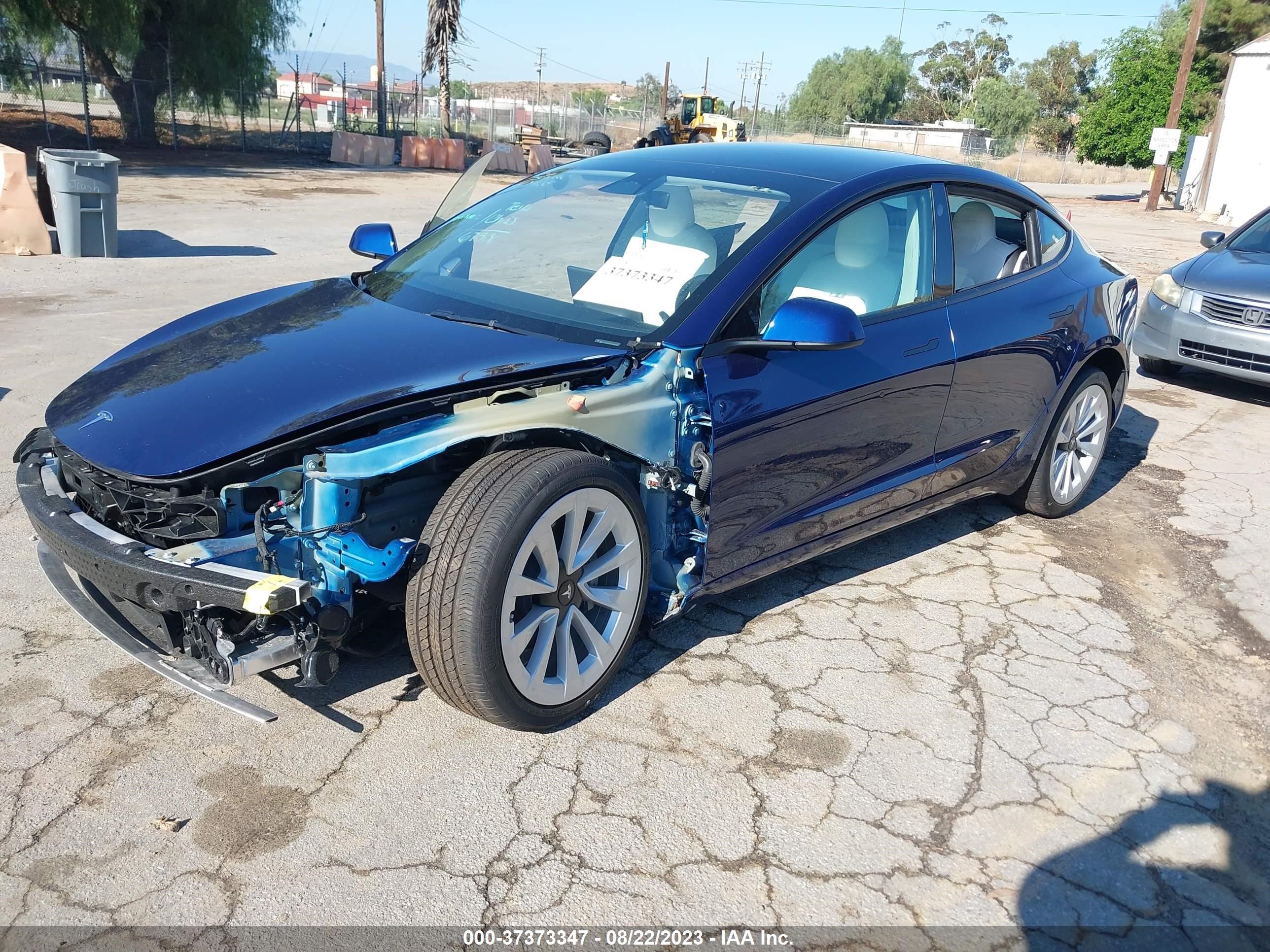 5YJ3E1EB1NF338899  tesla model 3 2022 IMG 1