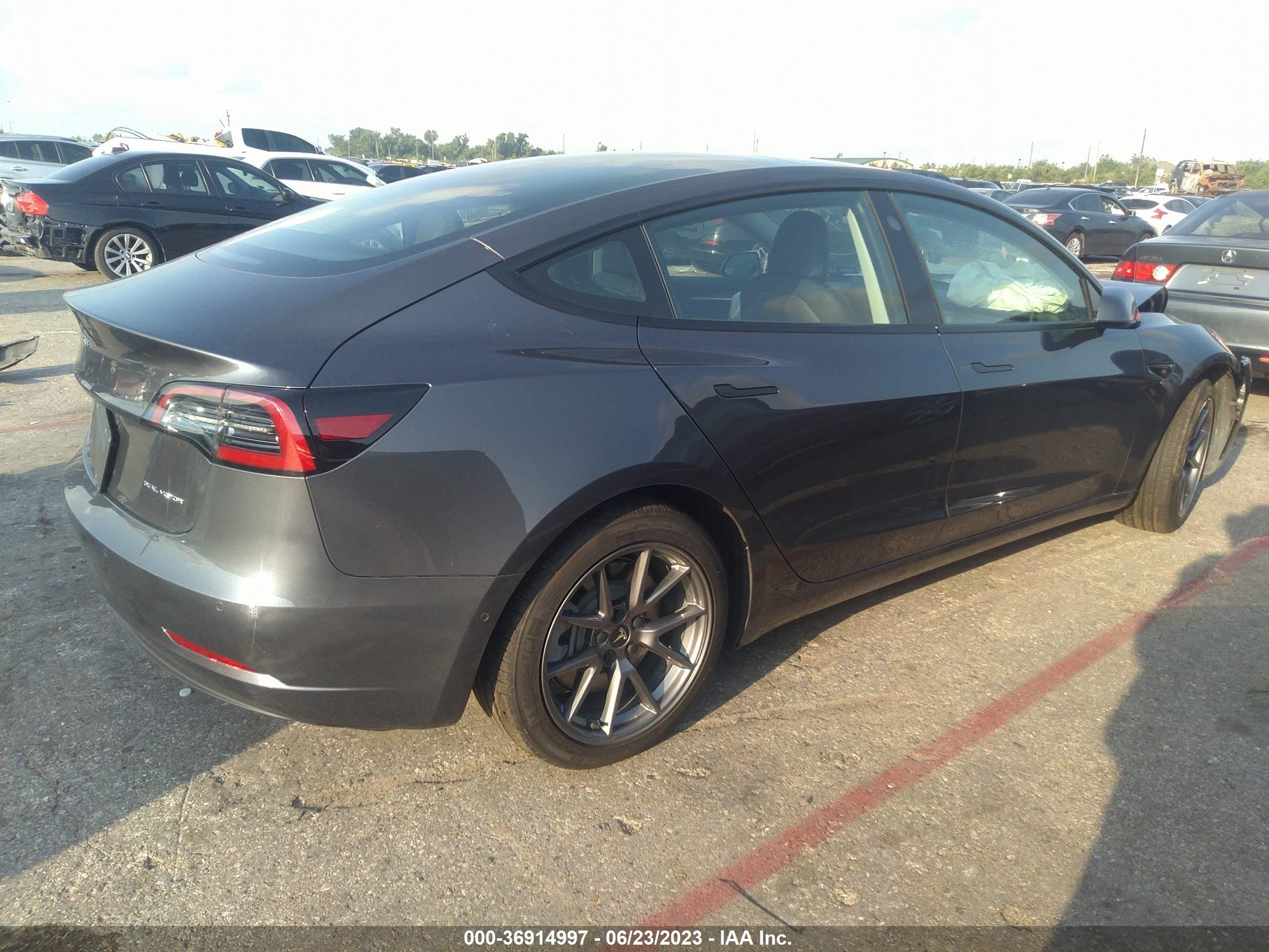 5YJ3E1EB2NF227651  tesla model 3 2022 IMG 3