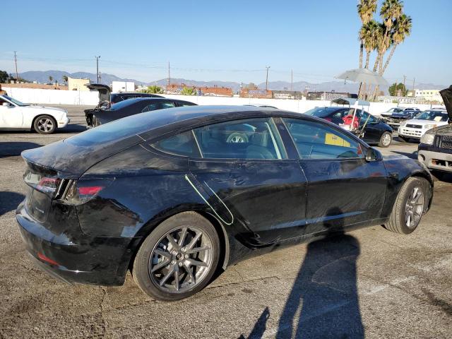 5YJ3E1EB2NF234695  tesla model 3 2022 IMG 2