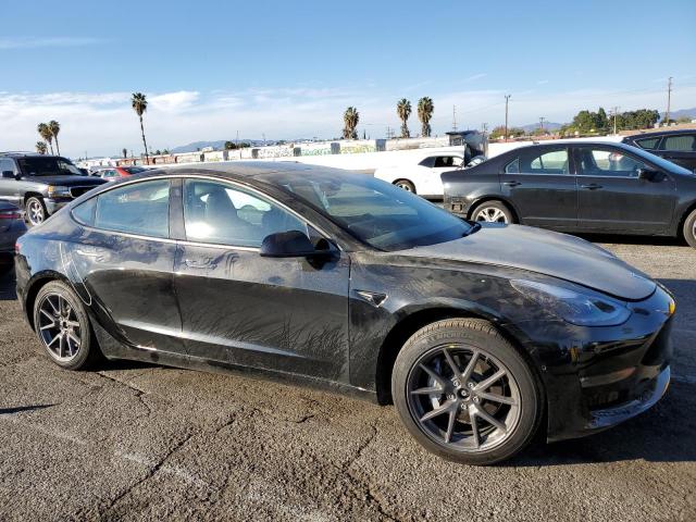 5YJ3E1EB2NF234695  tesla model 3 2022 IMG 3