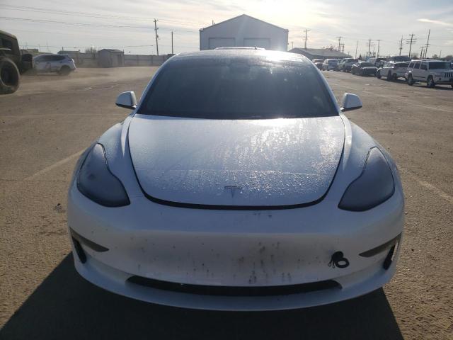 5YJ3E1EB5NF329848  tesla model 3 2022 IMG 4