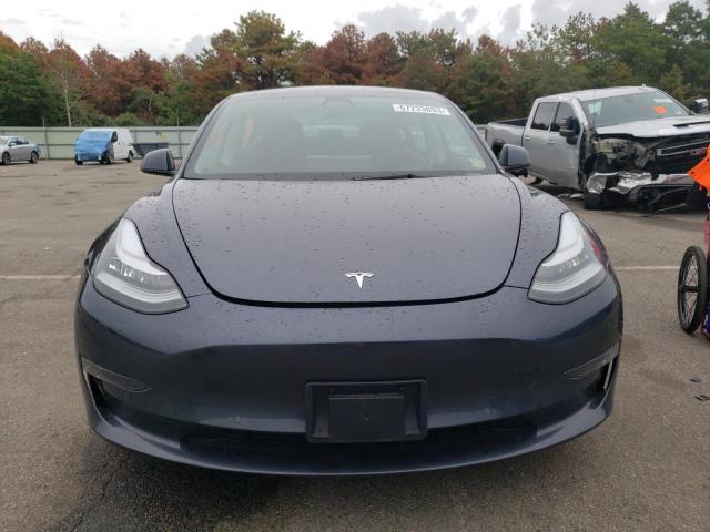 5YJ3E1EB6NF242590  tesla model 3 2022 IMG 4