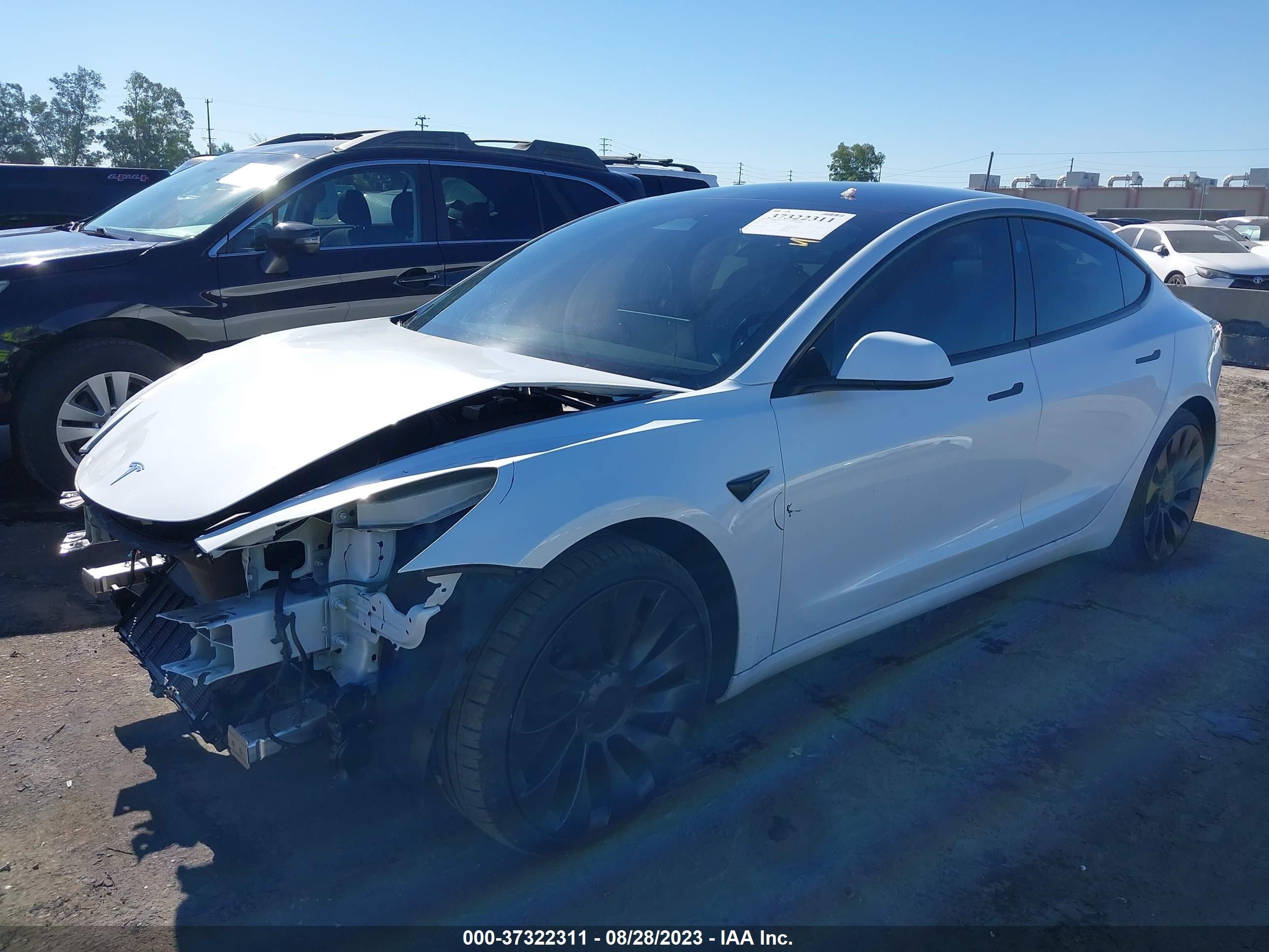 5YJ3E1EC0NF363074  tesla model 3 2022 IMG 1