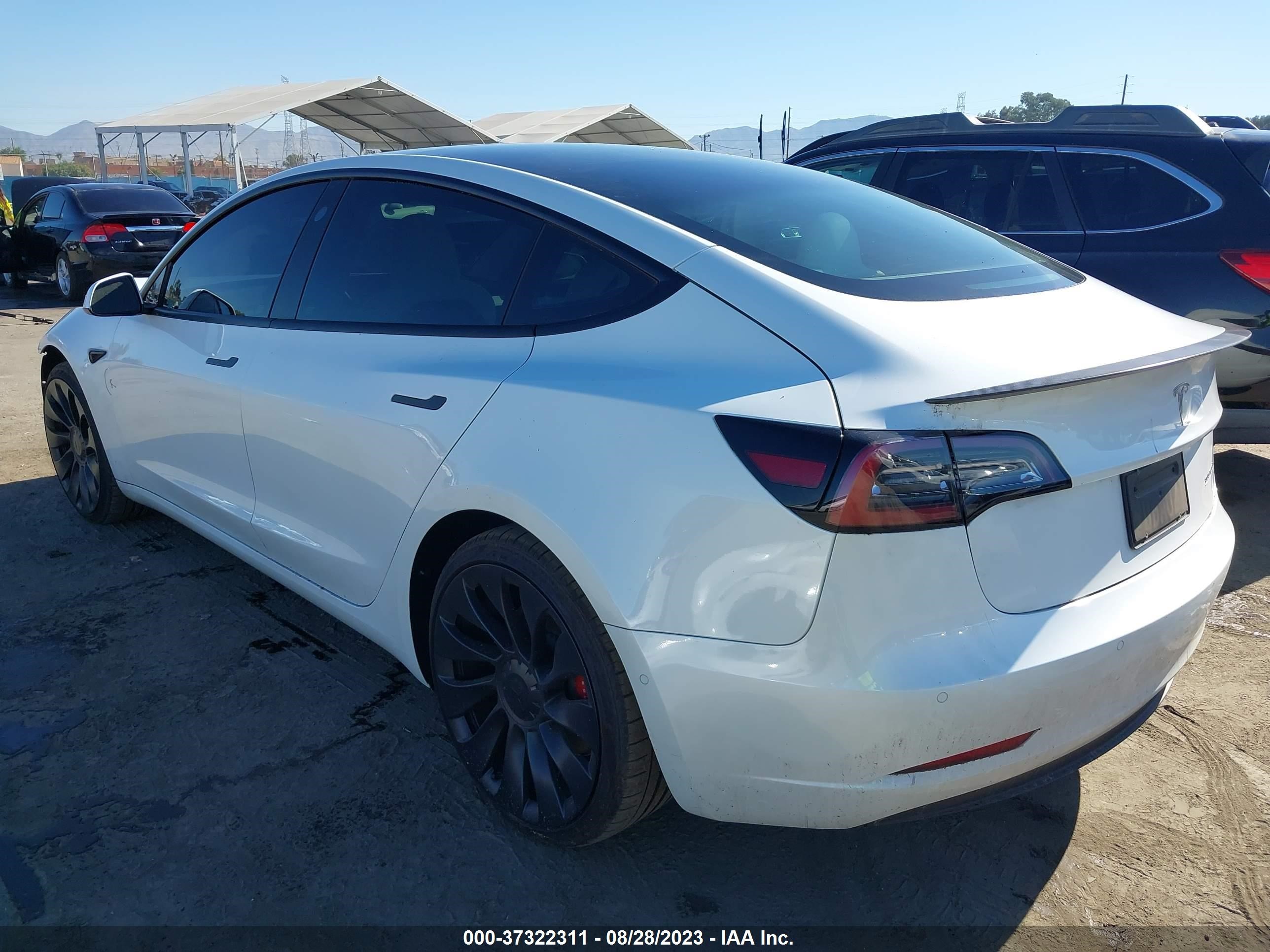 5YJ3E1EC0NF363074  tesla model 3 2022 IMG 2