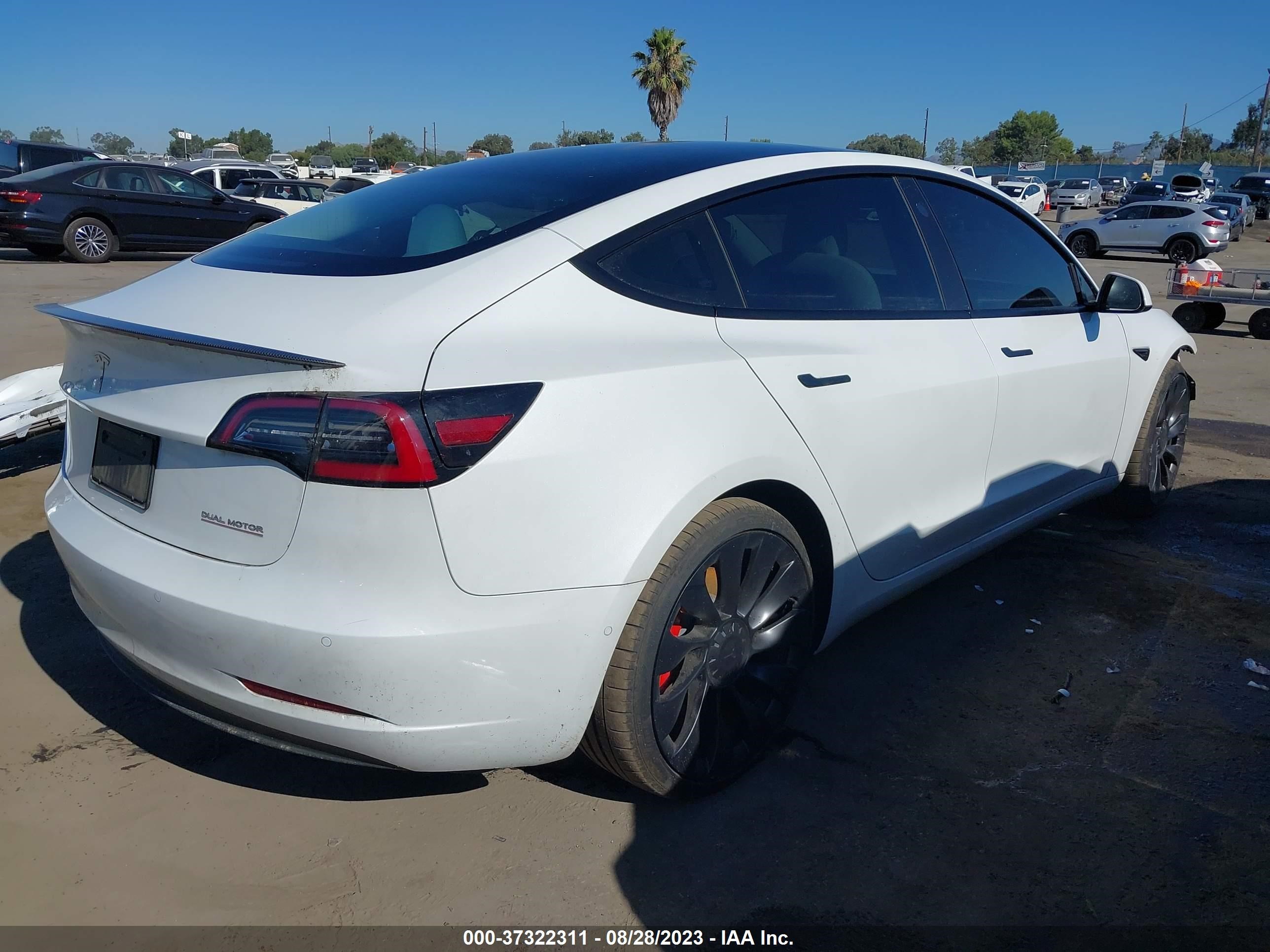 5YJ3E1EC0NF363074  tesla model 3 2022 IMG 3