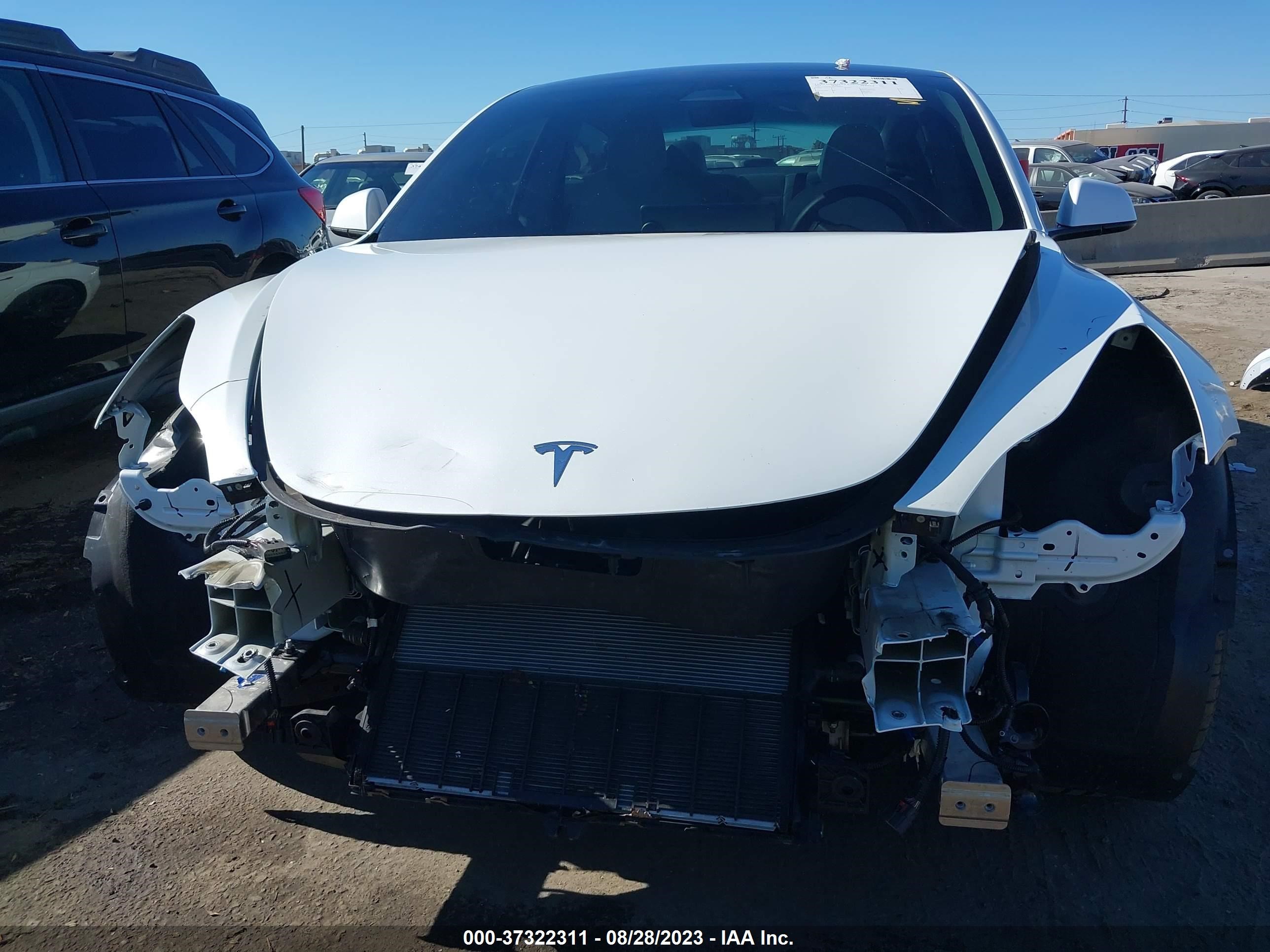 5YJ3E1EC0NF363074  tesla model 3 2022 IMG 5