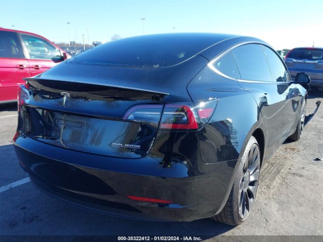 5YJ3E1EC2NF335874  tesla model 3 2022 IMG 3