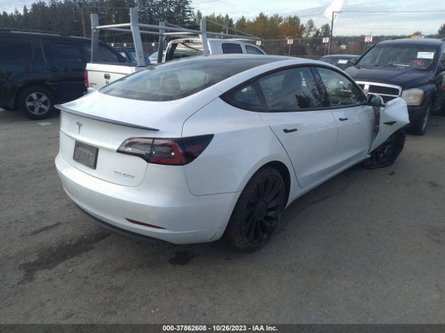 5YJ3E1ECXNF315761  tesla model 3 2022 IMG 3