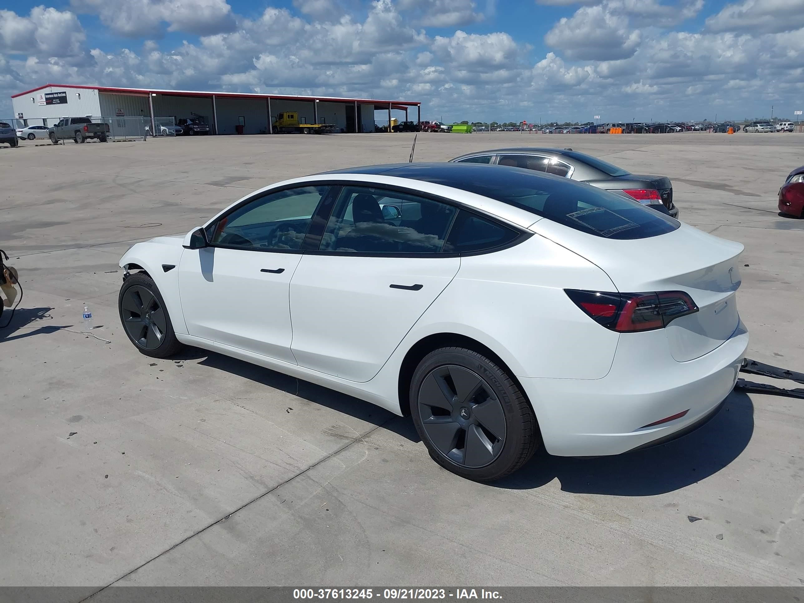 5YJ3E1EA5PF605617  tesla model 3 2023 IMG 2