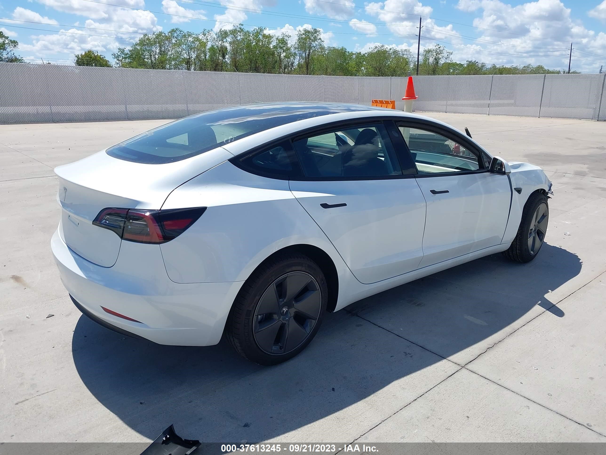 5YJ3E1EA5PF605617  tesla model 3 2023 IMG 3