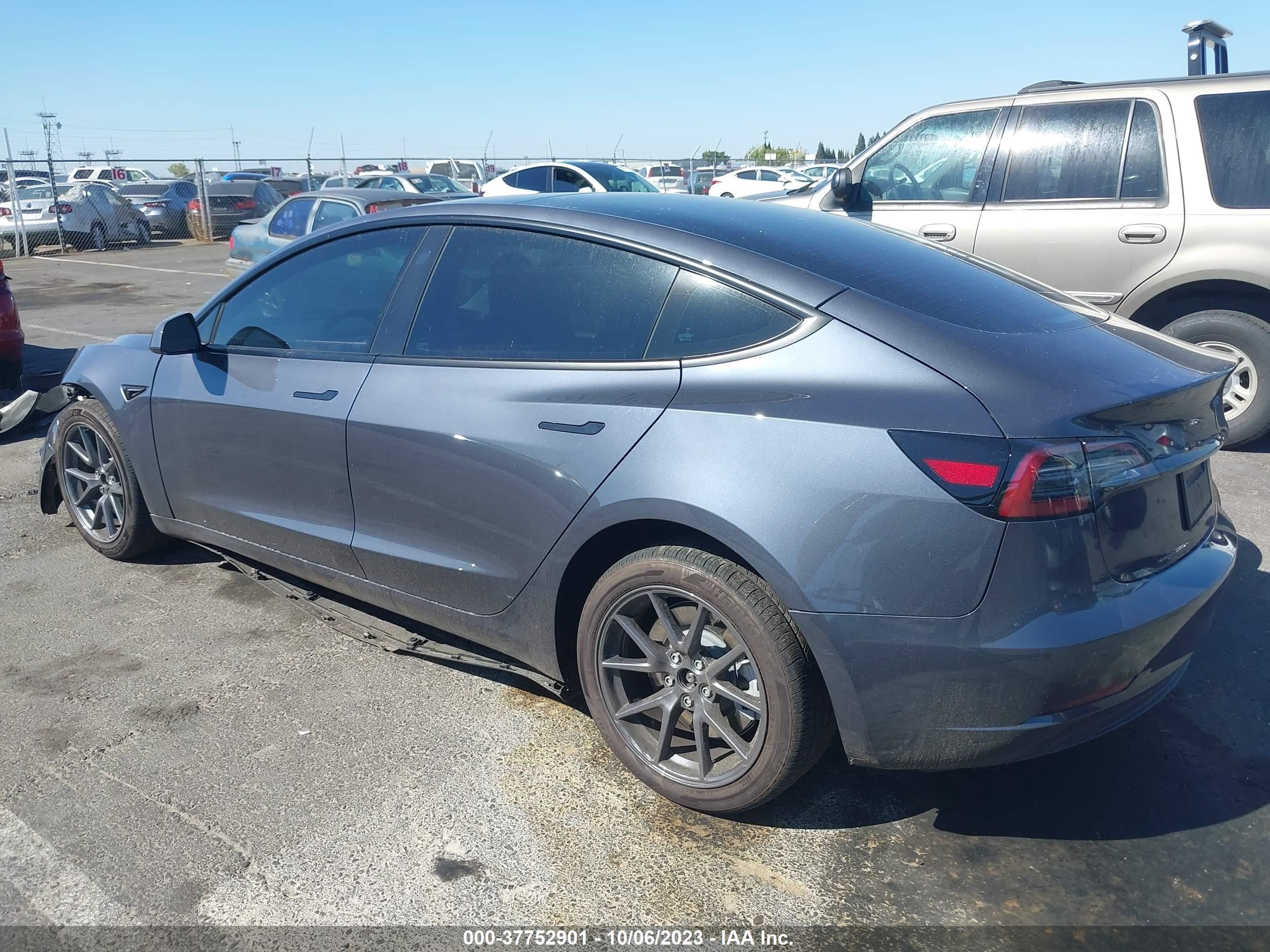 5YJ3E1EB2PF594083  tesla model 3 2023 IMG 2