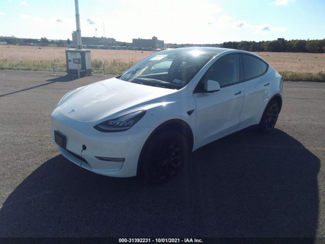 5YJYGDEE0LF048758  tesla model y 2020 IMG 1