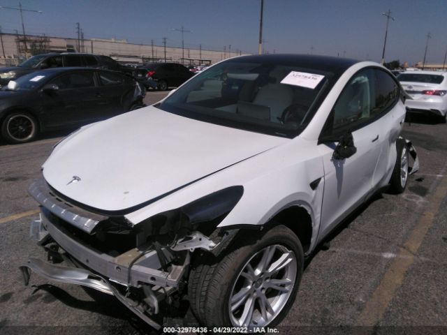 5YJYGDEE6MF076128  tesla model y 2021 IMG 1