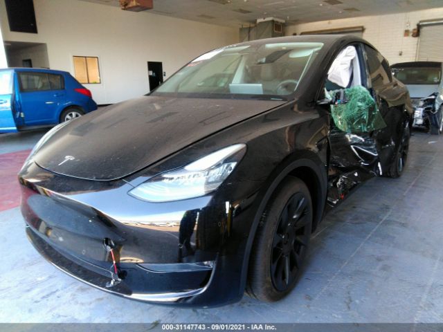 5YJYGDEE9MF065382  tesla model y 2021 IMG 1