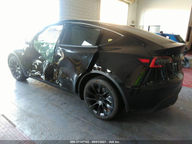 5YJYGDEE9MF065382  tesla model y 2021 IMG 2