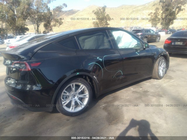 5YJYGAEE1MF157603  tesla model y 2021 IMG 3