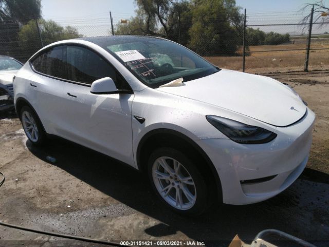 5YJYGAEE2MF160090  tesla model y 2021 IMG 0