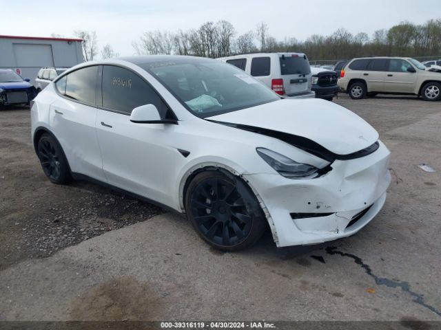 5YJYGAEE2MF299457  tesla model y 2021 IMG 0