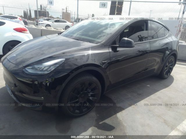 5YJYGDED1MF173986  tesla model y 2021 IMG 1