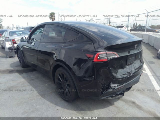 5YJYGDED1MF173986  tesla model y 2021 IMG 2