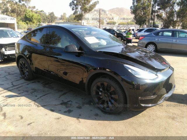 5YJYGDEE1MF115532  tesla model y 2021 IMG 0