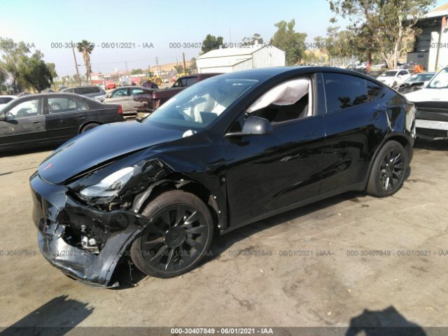 5YJYGDEE1MF115532  tesla model y 2021 IMG 1