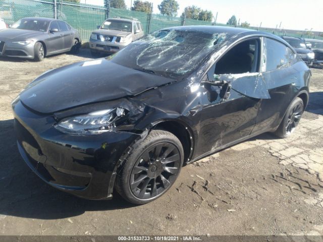 5YJYGDEE1MF141483  tesla model y 2021 IMG 1