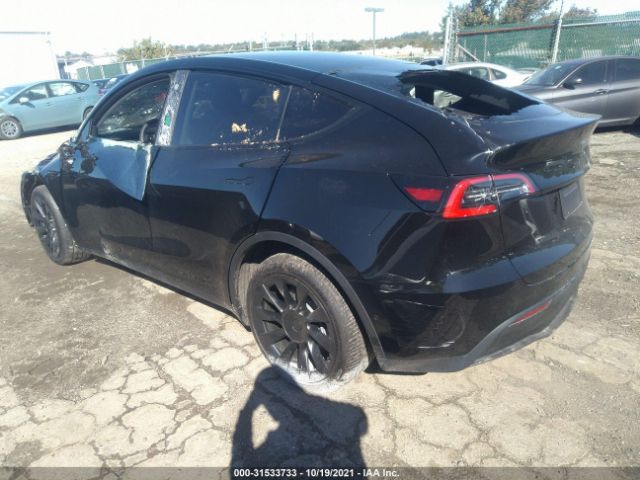 5YJYGDEE1MF141483  tesla model y 2021 IMG 2