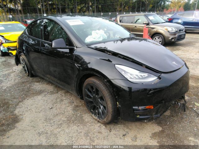 5YJYGDEE1MF231832  tesla model y 2021 IMG 0