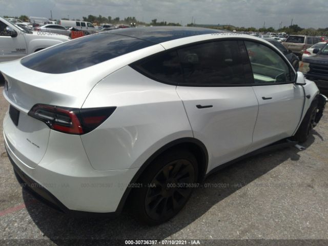 5YJYGDEE4MF108722  tesla model y 2021 IMG 3