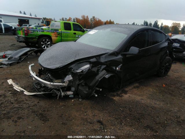 5YJYGDEE5MF129532  tesla model y 2021 IMG 1