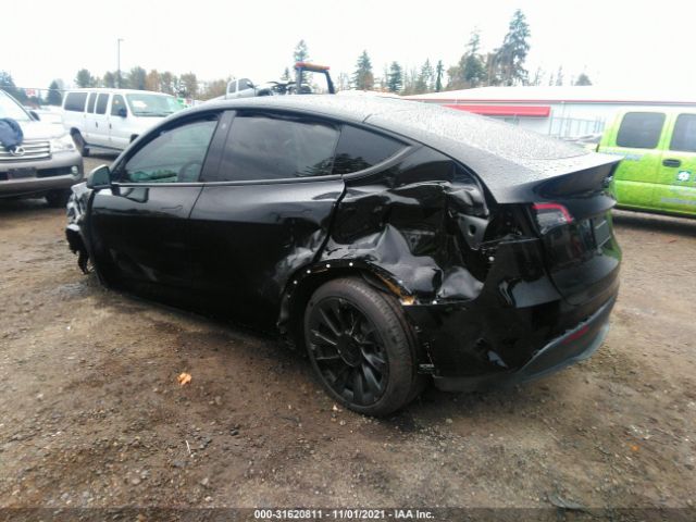 5YJYGDEE5MF129532  tesla model y 2021 IMG 2