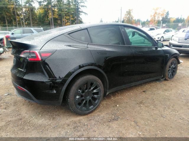 5YJYGDEE5MF129532  tesla model y 2021 IMG 3