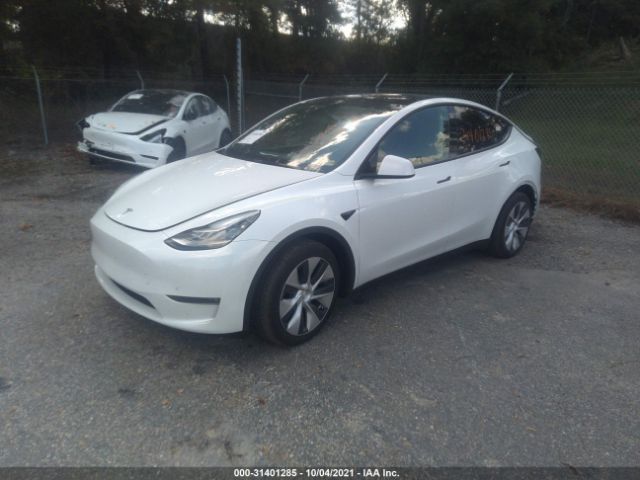 5YJYGDEE5MF204357  tesla model y 2021 IMG 1