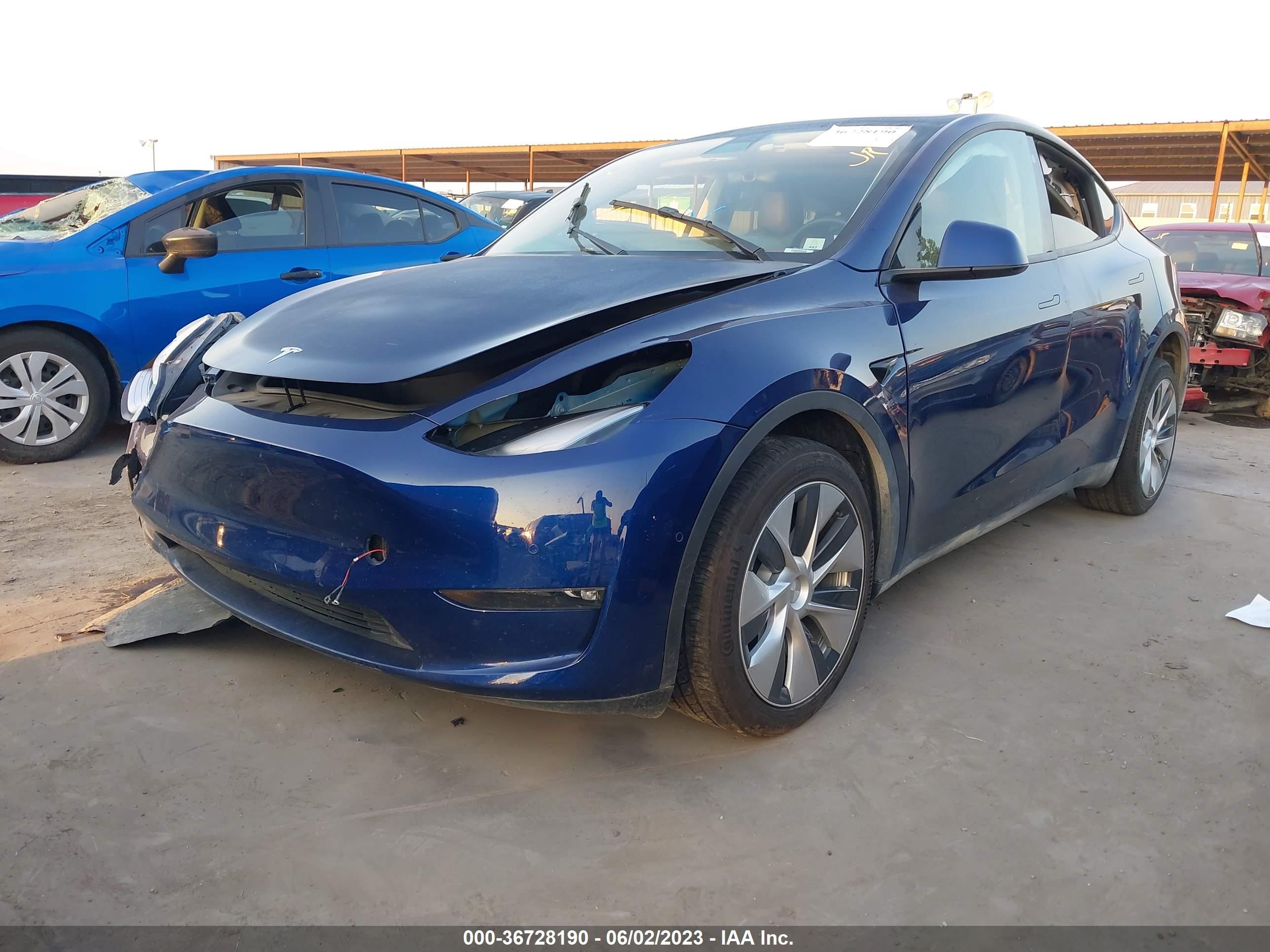 7SAYGDEE2NF322211  tesla model y 2021 IMG 1