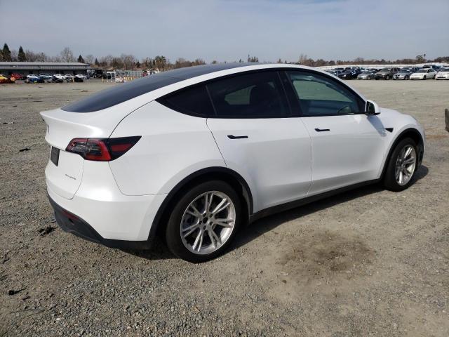 7SAYGDEE7NF321099  tesla model y 2022 IMG 2