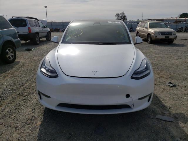 7SAYGDEE7NF321099  tesla model y 2022 IMG 4