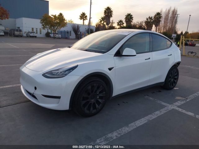 7SAYGDEE9NF341239  tesla model y 2021 IMG 1