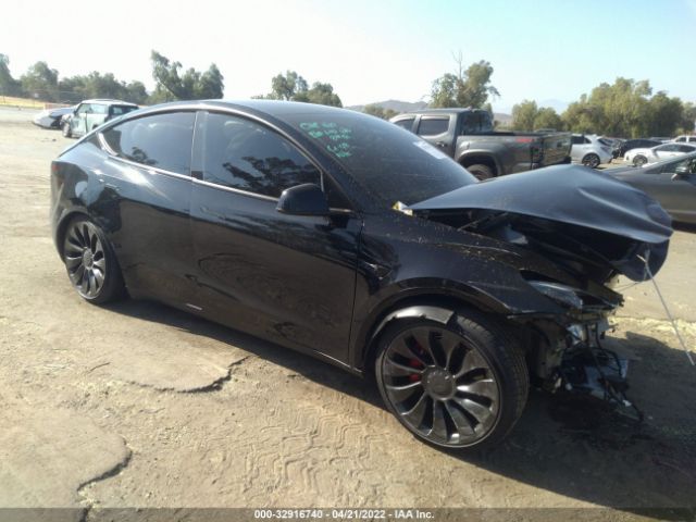 7SAYGDEF0NF347021  tesla model y 2022 IMG 0